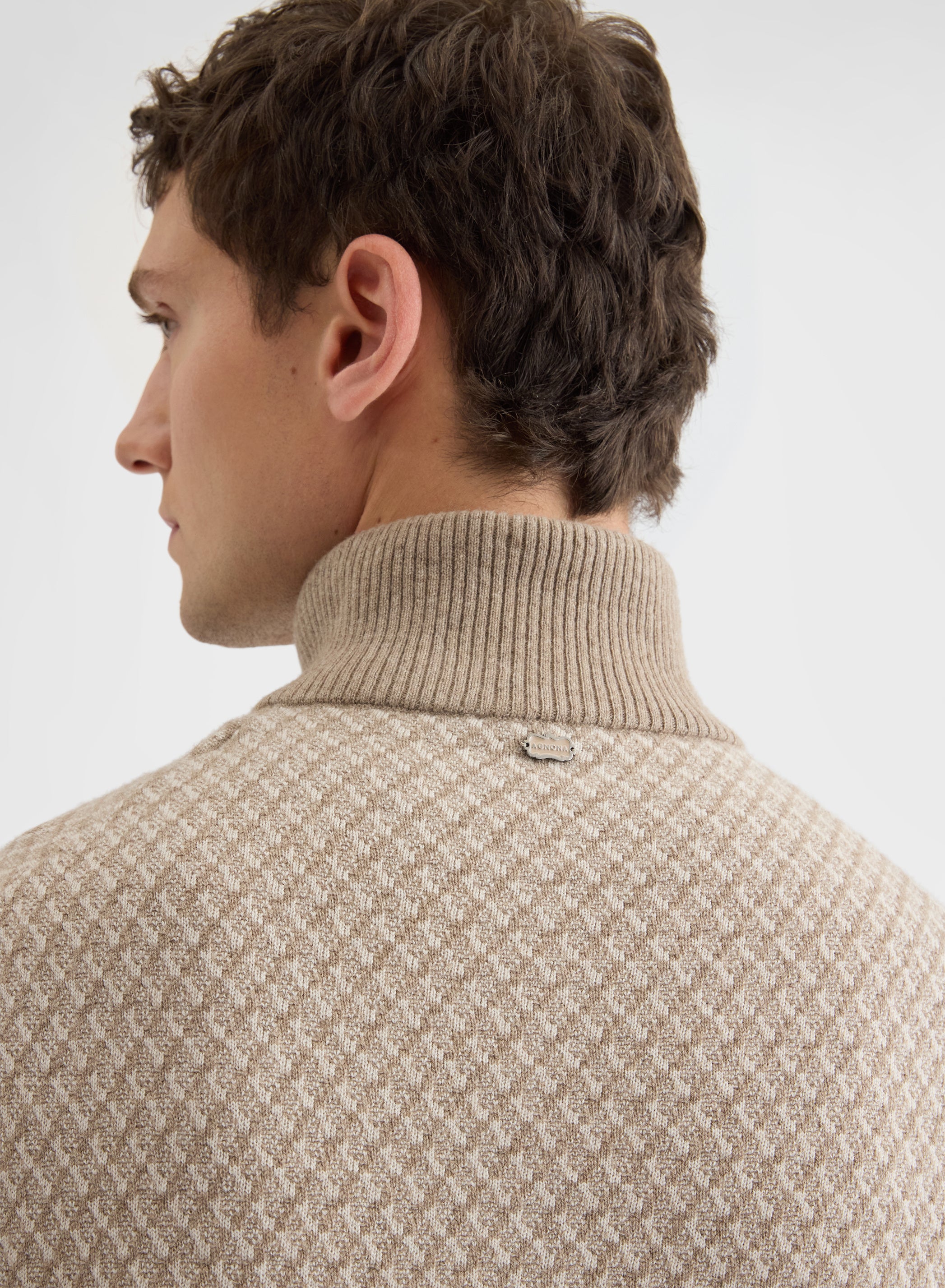 ARGYLE JACQUARD HIGH NECK HALF ZIP SWEATER